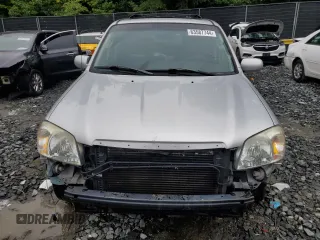 2005 Mazda Tribute LX with VIN 4F2YZ94185KM47932, listed as a Copart auction lot 63587744 with 203,178 mi miles and Salvage Title. Bid and sale history available at carsss.com. Image 5.