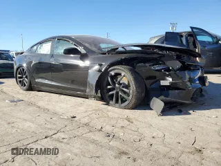 2023 Tesla Model S with VIN 5YJSA1E5XPF519570, listed as a Copart auction lot 80573863 with Not provided miles and Salvage title. Bid and sale history available at DreamBid. Image 4.