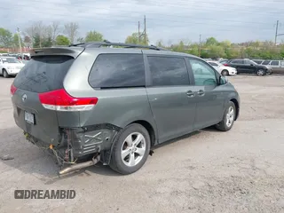 2014 Toyota Sienna LE AAS with VIN 5TDKK3DC8ES432364, listed as a IAAI auction lot 42081378 with 187,131 mi miles and . Bid and sale history available at DreamBid. Image 4.