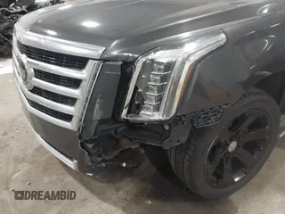 2015 Cadillac Escalade Premium z VIN 1GYS4CKJ8FR308617, wystawiony jako IAAI lot #41974608 z przebiegiem 154 014 mil mil oraz . Historia ofert i sprzedaży dostępna na DreamBid. Obrazek 6.