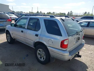 2001 Isuzu Rodeo S with VIN 4S2DM58WX14352481, listed as a IAAI auction lot 41796652 with 162,696 mi miles and . Bid and sale history available at DreamBid. Image 3.
