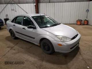 2002 Ford Focus LX with VIN 1FAFP33P92W148086, listed as a Copart auction lot 72825424 with 235,066 mi miles and Clean Title. Bid and sale history available at DreamBid. Image 4.