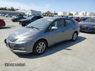 2010 Honda Insight EX with VIN JHMZE2H7XAS021268, listed as a Copart auction lot 54179245 with 211,561 mi miles and Salvage Title. Bid and sale history available at DreamBid. Image 1.