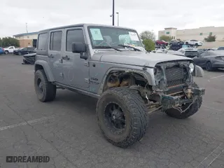 2015 Jeep Wrangler Unlimited Sport with VIN 1C4HJWDG7FL590926, listed as a IAAI auction lot 41763927 with 172,674 mi miles. Bid and sale history available at carsss.com. Image 1.
