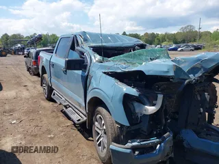 2023 Ford F-150 XL with VIN 1FTFW1E53PKD99214, listed as a IAAI auction lot 42211755 with 31 mi miles and . Bid and sale history available at DreamBid. Image 13.