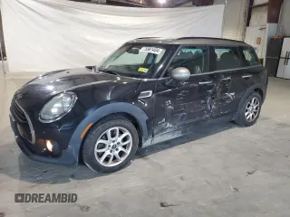 2017 MINI Clubman Cooper with VIN WMWLU1C55H2F26865, listed as a Copart auction lot 75981404 with 98,979 mi miles and Salvage Title. Bid and sale history available at carsss.com. Image 1.