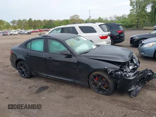 2021 Alfa Romeo Giulia Ti z VIN ZARFANBN5M7643816, wystawiony jako IAAI lot #42231651 z przebiegiem 36 195 mil mil oraz . Historia ofert i sprzedaży dostępna na DreamBid. Obrazek 13.