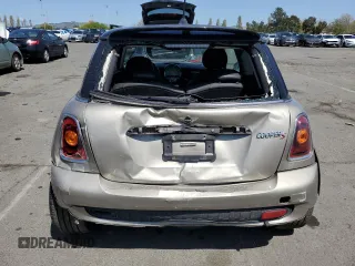 2009 MINI Hardtop S with VIN WMWMF73549TT94143, listed as a Copart auction lot 52120615 with 144,334 mi miles and Salvage Title. Bid and sale history available at DreamBid. Image 6.