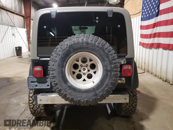 2005 Jeep Wrangler Rubicon with VIN 1J4FA69S85P368210, listed as a Copart auction lot 73425664 with 123,297 mi miles and Salvage Title. Bid and sale history available at carsss.com. Image 6.