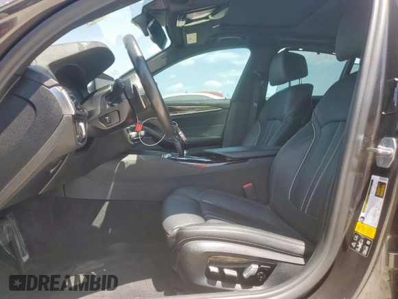2019 BMW 5 Series M550i xDrive with VIN WBAJB9C51KB287797, listed as a Copart auction lot 65382465 with 61,459 mi miles and Salvage title. Bid and sale history available at DreamBid. Image 7.