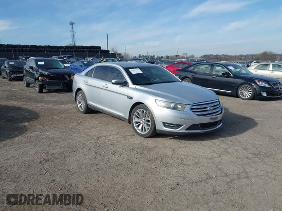 2014 Ford Taurus Limited with VIN 1FAHP2F86EG134779, listed as a IAAI auction lot 41660527 with 115,016 mi miles. Bid and sale history available at carsss.com. Image 1.