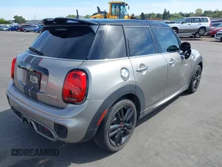 2019 MINI Hardtop 4 Door Cooper S with VIN WMWXU3C5XK2H55160, listed as a IAAI auction lot 42024249 with 49,944 mi miles and . Bid and sale history available at DreamBid. Image 4.