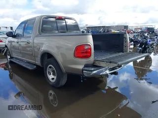 2003 Ford F-150 XLT with VIN 1FTRW07L53KD82167, listed as a IAAI auction lot 41745801 with 216,783 mi miles. Bid and sale history available at carsss.com. Image 3.