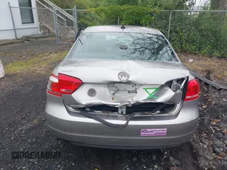 2013 Volkswagen Passat SE with VIN 1VWBP7A33DC041410, listed as a IAAI auction lot 42427033 with Not provided miles and . Bid and sale history available at DreamBid. Image 16.