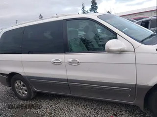 2005 Kia Sedona LX with VIN KNDUP132X56742698, listed as a IAAI auction lot 41637967 with 118,346 mi miles. Bid and sale history available at carsss.com. Image 14.