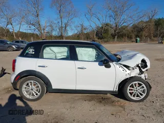 2015 MINI Countryman z VIN WMWZB3C53FWR43884, wystawiony jako IAAI lot #41296213 z przebiegiem 111 934 mil mil oraz . Historia ofert i sprzedaży dostępna na DreamBid. Obrazek 14.