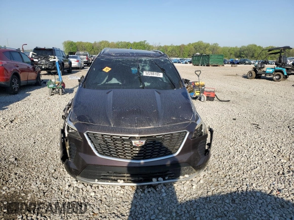 2021 Cadillac XT4 FWD Premium Luxury z VIN 1GYFZCR45MF002654, wystawiony jako Copart lot #52288105 z przebiegiem Nie podano mil oraz Szkody całkowita. Historia ofert i sprzedaży dostępna na DreamBid. Obrazek 5.