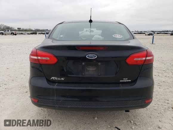 2016 Ford Focus SE with VIN 1FADP3F25GL269715, listed as a Copart auction lot 87761335 with 100,064 mi miles and Clean title. Bid and sale history available at DreamBid. Image 6.