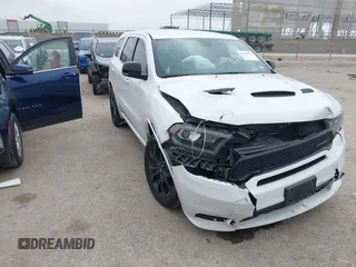 2019 Dodge Durango R/T with VIN 1C4SDHCT7KC659048, listed as a IAAI auction lot 42388312 with 96,074 mi miles and . Bid and sale history available at DreamBid. Image 1.