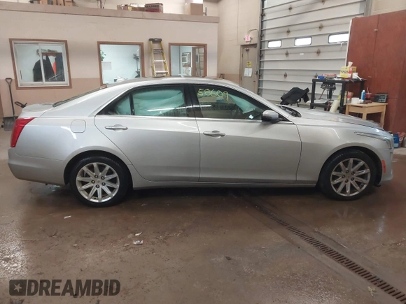 2014 Cadillac CTS Luxury AWD with VIN 1G6AX5S3XE0158960, listed as a IAAI auction lot 41258609 with 84,360 mi miles and . Bid and sale history available at DreamBid. Image 13.