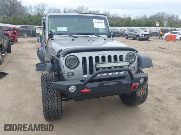 2015 Jeep Wrangler Unlimited Rubicon with VIN 1C4BJWFG1FL546018, listed as a IAAI auction lot 42060045 with 107,249 mi miles and . Bid and sale history available at DreamBid. Image 6.