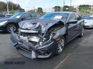 2018 Honda Civic LX with VIN 2HGFC2F58JH514161, listed as a IAAI auction lot 42073133 with 117,658 mi miles. Bid and sale history available at carsss.com. Image 2.