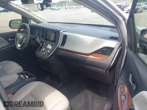 2015 Toyota Sienna XLE with VIN 5TDYK3DC5FS685735, listed as a IAAI auction lot 42139229 with 87,694 mi miles and . Bid and sale history available at DreamBid. Image 5.