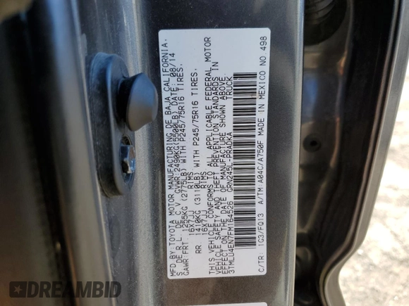 2015 Toyota Tacoma with VIN 3TMLU4EN7FM164526, listed as a Copart auction lot 50977395 with 124,222 mi miles and Salvage Title. Bid and sale history available at carsss.com. Image 14.