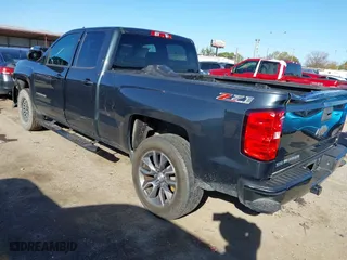 2017 Chevrolet Silverado 1500 LT with VIN 1GCVKRECXHZ154083, listed as a IAAI auction lot 41216478 with 153,599 mi miles. Bid and sale history available at carsss.com. Image 3.