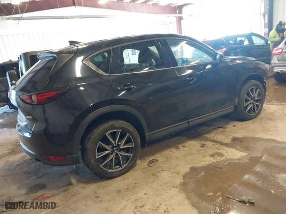 2017 Mazda CX-5 Grand Touring with VIN JM3KFBDLXH0206999, listed as a IAAI auction lot 41649611 with 73,382 mi miles. Bid and sale history available at carsss.com. Image 4.