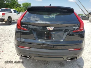 2023 Cadillac XT4 FWD Luxury с VIN 1GYAZAR47PF107473, выставлен на аукционе Copart как лот 59137665 с пробегом 9 198 миль миль и Списание • Salvage title. История ставок и продаж доступна на DreamBid. Изображение 6.