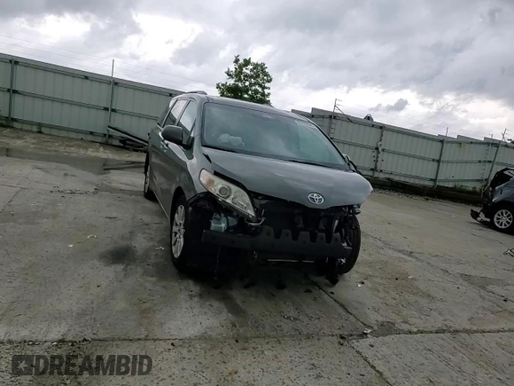 2011 Toyota Sienna XLE AAS with VIN 5TDYK3DC9BS120799, listed as a Copart auction lot 61470045 with 194,422 mi miles and Salvage title. Bid and sale history available at DreamBid. Image 14.