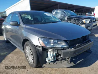 2015 Volkswagen Passat 1.8T Wolfsburg Ed with VIN 1VWAT7A3XFC010262, listed as a IAAI auction lot 41860210 with 99,775 mi miles. Bid and sale history available at carsss.com. Image 1.