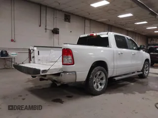 2019 Ram 1500 Big Horn/Lone Star with VIN 1C6SRFFT7KN645776, listed as a IAAI auction lot 41395240 with 136,068 mi miles. Bid and sale history available at carsss.com. Image 4.