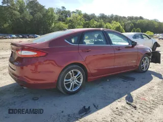 2016 Ford Fusion SE Hybrid with VIN 3FA6P0LU7GR162714, listed as a Copart auction lot 57532635 with 151,633 mi miles and Salvage title. Bid and sale history available at DreamBid. Image 3.
