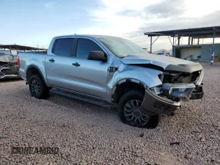 2021 Ford Ranger XL with VIN 1FTER4EHXMLD23865, listed as a Copart auction lot 43779385 with 39,744 mi miles and Salvage Title. Bid and sale history available at DreamBid. Image 4.