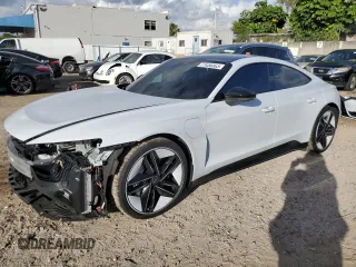 2023 Audi RS e-tron GT z VIN WAUBHBFW6P7900375, wystawiony jako Copart lot #77436303 z przebiegiem 1862 mil mil oraz . Historia ofert i sprzedaży dostępna na DreamBid. Obrazek 1.