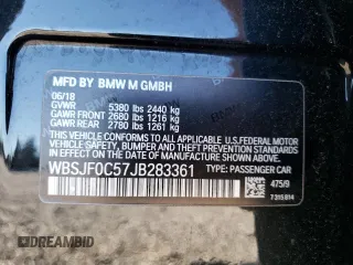 2018 BMW M5 z VIN WBSJF0C57JB283361, wystawiony jako Copart lot #65352164 z przebiegiem Nie podano mil oraz Szkoda całkowita • Salvage title. Historia ofert i sprzedaży dostępna na DreamBid. Obrazek 12.
