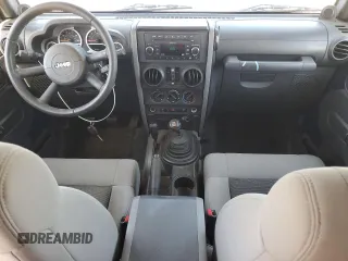 2010 Jeep Wrangler Unlimited Rubicon with VIN 1J4HA6H15AL225234, listed as a Copart auction lot 61270505 with 110,332 mi miles and Clean title. Bid and sale history available at DreamBid. Image 8.
