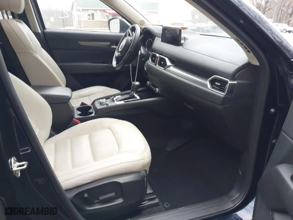 2023 Mazda CX-5 2.5 S Carbon Edition with VIN JM3KFBCM3P0244020, listed as a IAAI auction lot 41693880 with 26,342 mi miles. Bid and sale history available at carsss.com. Image 5.