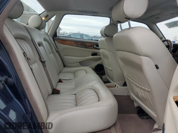 2001 Jaguar XJ with VIN SAJDA14C41LF38763, listed as a Copart auction lot 86796434 with 60,076 mi miles and Clean Title. Bid and sale history available at carsss.com. Image 10.