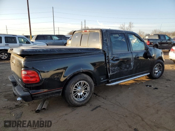 2001 Ford F-150 SuperCrew XLT with VIN 1FTRW07L71KA04123, listed as a Copart auction lot 48477755 with 128,808 mi miles and Clean Title. Bid and sale history available at carsss.com. Image 3.