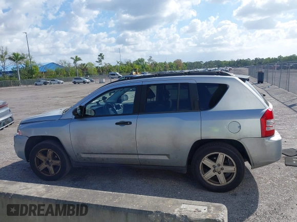 2007 Jeep Compass Sport with VIN 1J8FT47W57D185807, listed as a IAAI auction lot 41700283 with 194,339 mi miles. Bid and sale history available at carsss.com. Image 14.