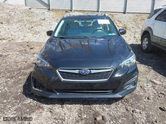2017 Subaru Impreza Premium with VIN 4S3GTAD65H3716428, listed as a IAAI auction lot 41942299 with 77,181 mi miles. Bid and sale history available at carsss.com. Image 13.