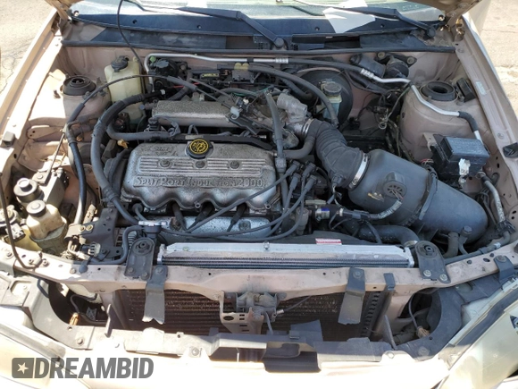 1998 Ford Escort SE with VIN 1FAFP13P7WW266180, listed as a Copart auction lot 61625005 with 143,982 mi miles and Salvage title. Bid and sale history available at DreamBid. Image 13.