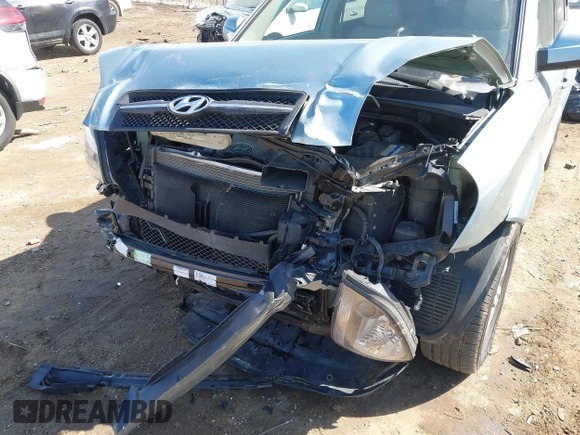 2006 Hyundai Tucson GLS with VIN KM8JN12D76U370922, listed as a IAAI auction lot 41800574 with 133,247 mi miles. Bid and sale history available at carsss.com. Image 6.