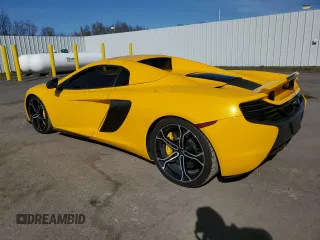 2016 McLaren 650S with VIN SBM11FAA6GW006251, listed as a Copart auction lot 52177065 with 14,614 mi miles and Clean Title. Bid and sale history available at DreamBid. Image 2.
