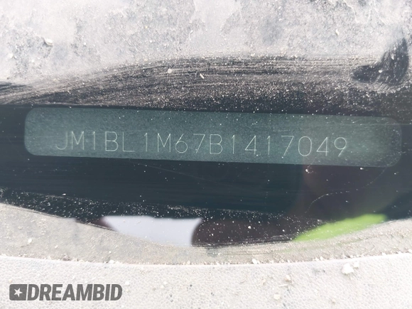 2011 Mazda 3 S Grand Touring z VIN JM1BL1M67B1417049, wystawiony jako IAAI lot #41628411 z przebiegiem 178 790 mil mil oraz . Historia ofert i sprzedaży dostępna na DreamBid. Obrazek 9.