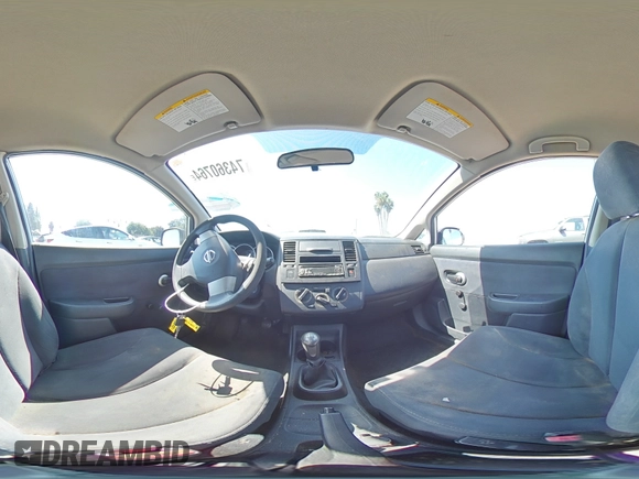 2009 Nissan Versa 1.6 z VIN 3N1CC11E09L445460, wystawiony jako Copart lot #74360764 z przebiegiem 202 122 mil mil oraz Szkoda całkowita • Salvage title. Historia ofert i sprzedaży dostępna na DreamBid. Obrazek 13.
