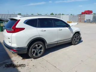 2018 Honda CR-V Touring with VIN 2HKRW2H92JH662753, listed as a IAAI auction lot 39538586 with 83,202 mi miles. Bid and sale history available at carsss.com. Image 4.
